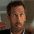 A four- shows a man in a suit with pixelated cyan text overlays reading "Yeah, whatever." and "Some of us LIKE having fun."
