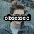 six pixelated images featuring a person with dark hair, each with overlaid text in various fonts and colors