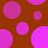 A static pattern of overlapping pink circles on a brown background with some partial and full circle shapes.