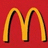 A golden-yellow stylized 'M' with black outlines on a solid red background, rendered in pixelated style.