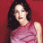 Pixelated static image of a woman with dark hair wearing a sleeveless pink top against a red background.