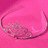 A split-screen image with a pink background on the left showing a pixelated tiara and a bright red background on the right with white pixelated text reading 'im a princess'.