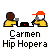 Pixel art of two figures in yellow shirts and orange caps at a table with a black laptop, labeled 'Carmen Hip Hopera' below.