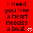 Red background with black text repeating 'i need you like a heart needss a beat' and white pixelated hearts, some hearts change from white to red.