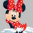 Pixelated image of a cartoon character with large black ears, red polka-dot bow, and matching dress on light gray background.