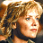 A pixelated contact sheet showing a character with curly blonde hair on the left and green text reading "Original Icons .com" on the right against a dark background.