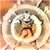 Pixelated circular icon with central dark brown curved shape surrounded by layered light and gray tones, set against warm orange-brown background.