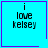 Four identical cyan squares with purple borders display 'i love kelsey' text; two squares have small purple symbols in corners.