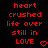 Red pixelated text on black background with two heart symbols, displaying 'heart crushed life over still in LOVE' and a small red heart icon.