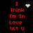 Red text on black background reads 'I Think Im In Love Wit U' with pixelated heart and star symbols above the text.