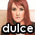 six pixelated images showing a woman with long red hair in various poses and backgrounds, some with overlaid text