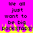 Bright pink background with black pixelated text reading "We all just want to be big ROCKSTARS!" and yellow flame-like shapes at the bottom.