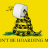 Pixelated yellow background with a green base, featuring a stylized figure holding a white object above its head and partially obscured text below.