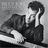Black-and-white pixelated image of a person with dark hair resting their head on a hand, next to red pixelated text reading "Sing us a song you're the Piano Man...".