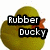 Yellow rubber duck with orange beak and feet, displaying text overlays and a single visible eye in different frames.
