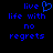 Blue pixelated text on black background reads 'live life with no regrets' with a heart symbol replacing the 'i' in 'live'.