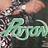 Pixelated image with light green stylized text on dark background, surrounded by abstract pixel clusters in brown and white tones.