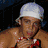 Six distinct display a person in various poses and attire, including a white cap with red accents, pink shorts, and a black-and-white image of the same figure