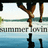 A pixelated static image shows a person in a brown outfit performing a handstand on a pier with water and sky in the background, with partially visible text below.