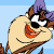 Two side-by-side pixelated frames of a cartoon character with brown fur, purple ears, and an orange beak-like mouth against a light blue background.