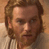 Static pixelated image of a male character with light brown hair and beard, wearing a white tunic against warm-toned background.