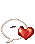Pixelated white speech bubble with red heart, transitioning from neutral to smiling faces and varying heart positions.