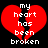 Red broken heart with white text 'my heart has been broken' on black background.