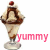 Pixelated ice cream sundae with chocolate syrup and cherry on top, featuring 'yummy' text in pink and green below.