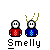 Pixel art of two figures in red and blue shirts with white faces, yellow sparkles above heads, text "Smelly" below each frame.