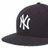 Six baseball caps with New York Yankees 'NY' logos in various color combinations displayed in a
