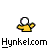 Pixelated yellow figure with white circular head performs four distinct hand gestures above "Hynkelcom" text on gray background.