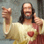 Pixelated figure with long dark hair and beard wears light robe over red garment, points both index fingers upward against gray background; green text reads "Original Icons .com" on right side.