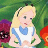 Static pixelated image of a cartoon character with blonde hair and blue bow tie holding green leaves, surrounded by flowers against green background.