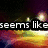Pixelated image of a colorful abstract background with glowing lights and partial text reading "seems like" and "growing".