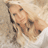 A 48x48 pixel buddy icon featuring a stylized image of Jessica Simpson on the left and text elements on the right, with visible pixelation and dithering effects.