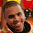 A pixelated image of a person in an orange and black outfit with text overlays reading "MRS. CHRIS BROWN!" and "(me!)".