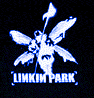 A vertical of four identical Linkin Park icons with varying color schemes, each featuring a winged figure holding a flag above the band name text