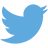 Blue bird silhouette with outstretched wings on light gray background, rendered in pixelated style.