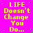 A static image with bright pink background and yellow text repeating 'LIFE Doesn't Change You Do...' in a pattern