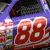 Animated contact sheet of a purple and red race car icon with number 88, showing multiple frames including close-ups, motion blur effects, and full vehicle views.
