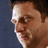 Pixelated image of a person's face with blue text reading 'Bobby Baby' and 'was robbed of his Tony.' on black background.