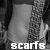 A grayscale pixelated image shows a figure with raised arms against a dark background, with the word 'scarfs' in bold white text at the bottom.