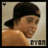 Pixelated image of a person with dark hair in a backward cap, overlaid on light blue and gray background with pink text.
