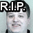 Pixelated image of a person with short dark hair and light skin, overlaid with large black-and-white 'R.I.P.' text above the head.