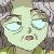 Pixelated static image of a pale, ghostly face with large light blue eyes and a small open mouth against a blurred background.