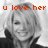 A four- of a smiling woman with blonde hair in black-and-white, overlaid with red pixelated text reading 'u love her not me but u do lol lol'