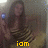 A person with long brown hair wearing a striped top holds a blue object, with yellow text below reading 'iam' in the first frame.