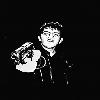 Black-and-white pixelated static icon of a person holding a guitar against a solid black background, with visible dithering and low-resolution rendering artifacts.