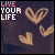 Animated icon with 'LIVE YOUR LIFE' text and floating hearts on dark background, pink/white lettering shifts between frames.