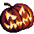 Pixelated pumpkin icon with carved face and internal flame glow, dark brown exterior, orange and yellow flame details, single stem on top, solid gray background.